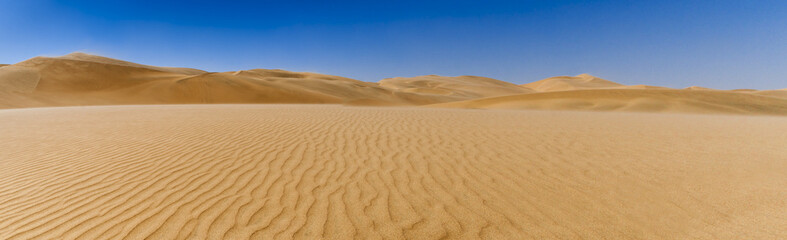 Fototapeta na wymiar Dunes on the Skeleton Coast / Dunes in Sandstorm at Skeleton Coast, Namib Desert, Namibia, Africa.
