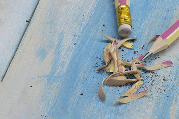 colourful pencil on blue background
