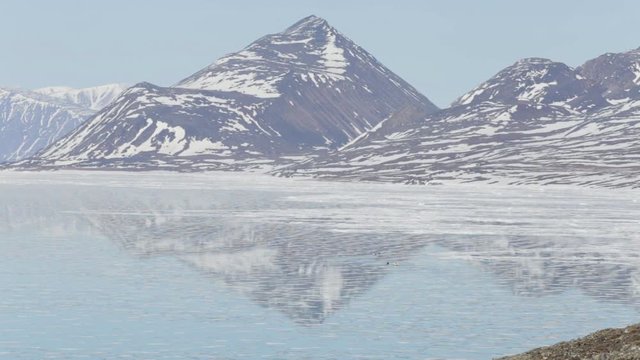 Ski doo Pulling a Qamutik Sled, Pond Inlet Nunavut