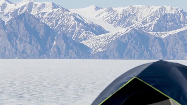 Beautiful landscape shot with a tent in the Foreground, Pond Inlet Nunavut
