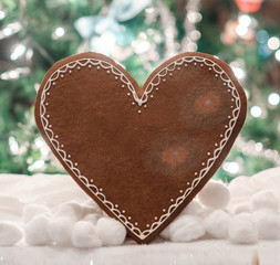 Christmas ginger bread cookie in heart shape. free space for text