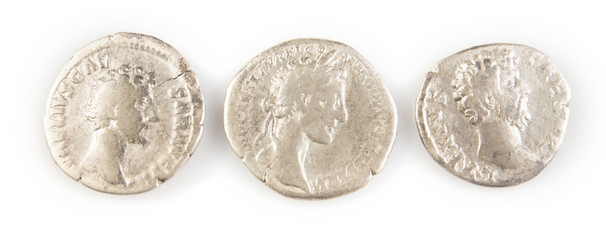 Roman denarius lie on a white background, the era of the Antonines, Marcus Aurelius, Antoninus Pius, Commodus, Caesar