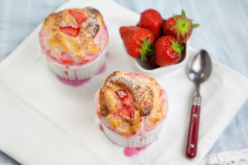 Strawberry souffle in ramekins