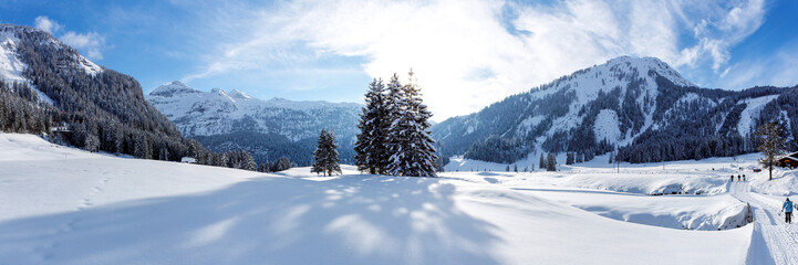 Panorama sunny cross-country ski trail in Gnade Alm, Hohe Tauern, Austria
