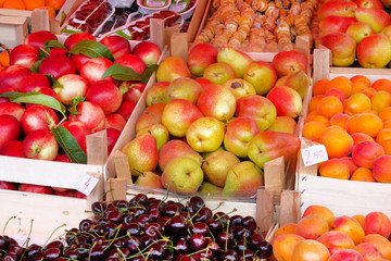 Fresh organic pears, apricots, nectarines, cherries, figs from mediterranean farmers market. Healthy local food summer market.