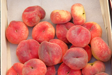 Peaches from mediterranean farmers market for sale. Healthy local organic food summer market.
