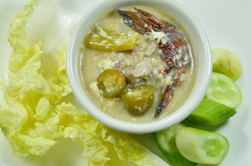 salt crab and minced pork with soy bean sauce dipping fresh vegetable on plate