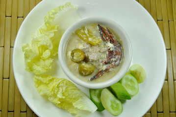 salt crab and minced pork with soy bean sauce dipping fresh vegetable on plate