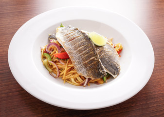 Trio of Fish Cooked on a Bed Of Noodles