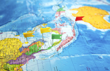 Fototapeta na wymiar World map with flags where to go on a trip