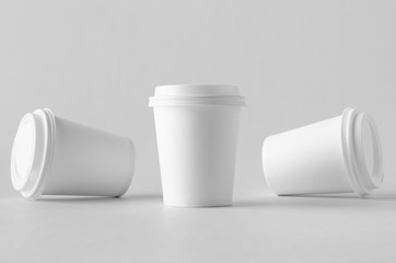 8 oz. white coffee paper cup mock-up with lid.