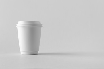 8 oz. white double wall coffee paper cup mock-up with lid.