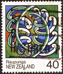 Maori art with ferns on new zealand postage stamp