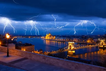 Zelfklevend Fotobehang Clouds and thunder lightnings and storm © Kavita