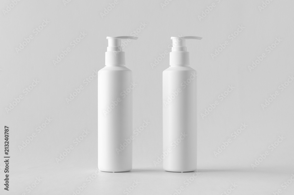 Wall mural White cosmetic shampoo dispenser bottle mock-up.