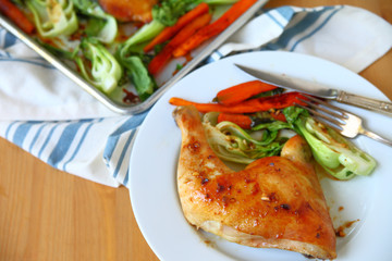 Whole chicken leg roasted with vegetables