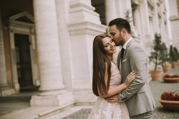 Young wedding couple on Capitoline hill in Rome