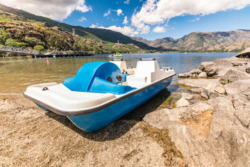 Boat pedal in the lake of Sanabria in Zamora (Castilla y Leon, Spain