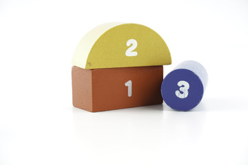 colourful Wooden building blocks over white background