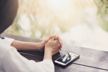 Obraz premium Woman prayer, Asian woman believe in the prayer to God, Christian student pray for study to pass the exam at the college . Bible and christian study concept