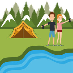 couple with smartphones in the camping zone