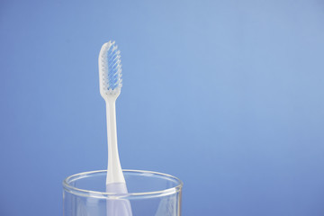 Toothbrush over a plain background