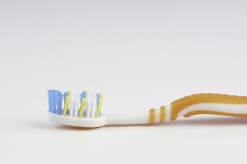 Toothbrush over a plain background