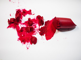 Close up cutted lipstick on white background,show color and texture of product.