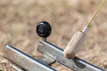 Hornussen, Nouss und Träf auf Bock (Detail)