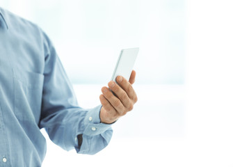 man holding mobile phone