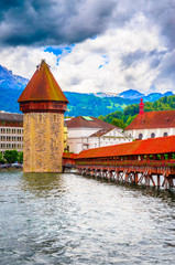 City center with famous Chapel Bridge and lake in Lucerne, Switzerland