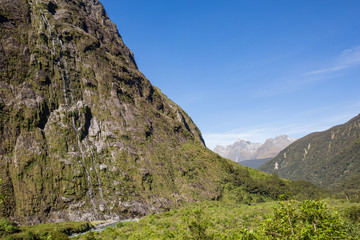 Mountain and stream with crystal clear water on the south island of New Zealand
