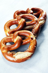 German pretzels with salt close-up on the table