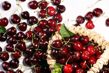 Cherry.A bunch of red fresh cherries on the table.