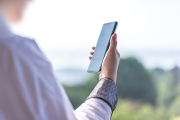 woman using smartphone