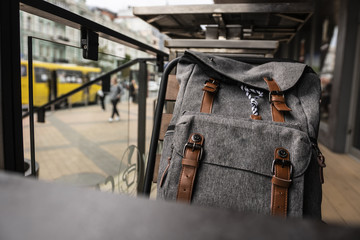 Vintage grey backpack in a cafe