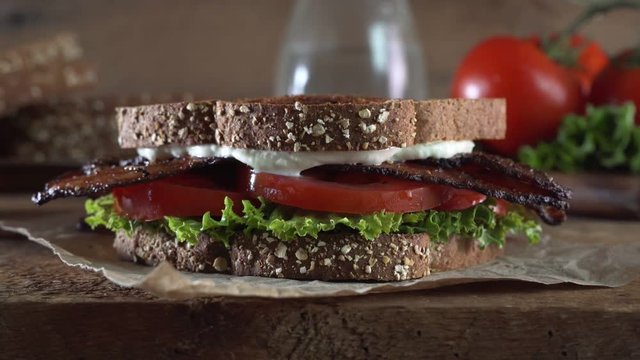 Parallax slider footage of a delicious BLT bacon, lettuce, and tomato sandwich.
