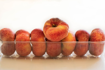 Different types of peaches ready to eat.