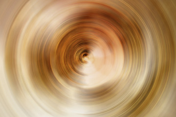 Gold orange abstract spiral background – creative sun concept