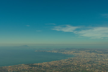view on city from mount Vesuvius volcano in Italy. coast of sea and city from above 