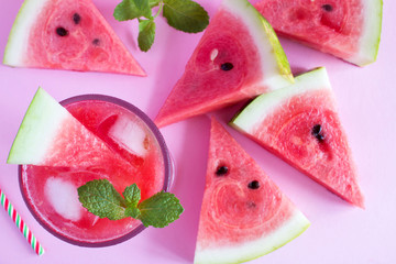 Cold watermelon lemonade  on the pink   background.Top view.