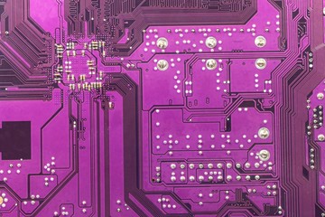 Violet circuit board background of computer motherboard.Computer chip Electronics motherboard high...