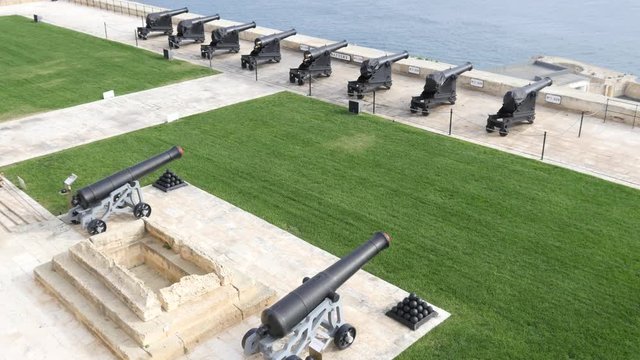 Valletta, Malta - History Museum in the open air - vintage guns pretending city