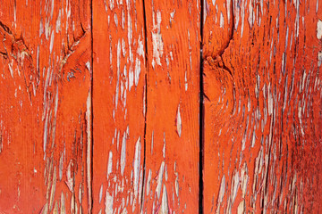 Background. The texture of the old wooden slats of beautiful red color