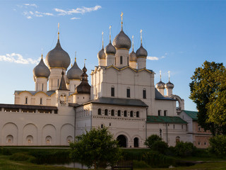 View of the Orthodox cathedrals of the Rostov Kremlin from the courtyard at sunset