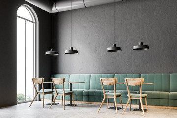 Dark gray wall bar corner, green sofas