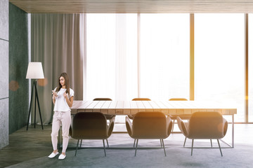 Gray panoramic dining room interior, woman