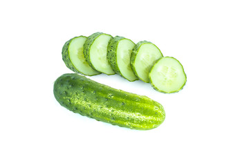 Fresh green cucumber, slice, chopped and whole, two vegetables, food ingredient, isolated on white background