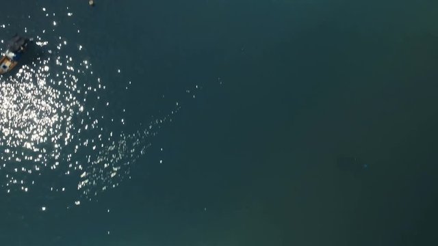 Cinematic Aerial shot flying towards Marsaxlokk in Malta