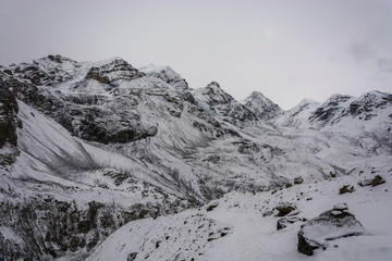 Fototapeta na wymiar Mountain landscape on the snow-covered Thorong La pass, Nepal.